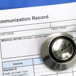 Immunization Record and a stethoscope