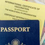 Blue passport and Yellow Fever card